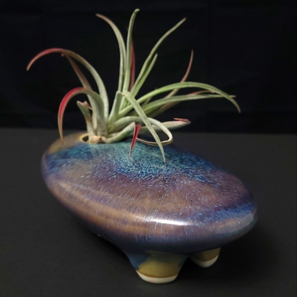 Ikebana blue oval vase with flower frog.